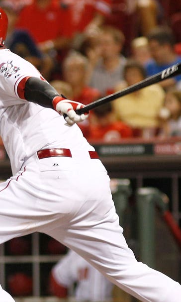Reds try to keep bats going against Miami